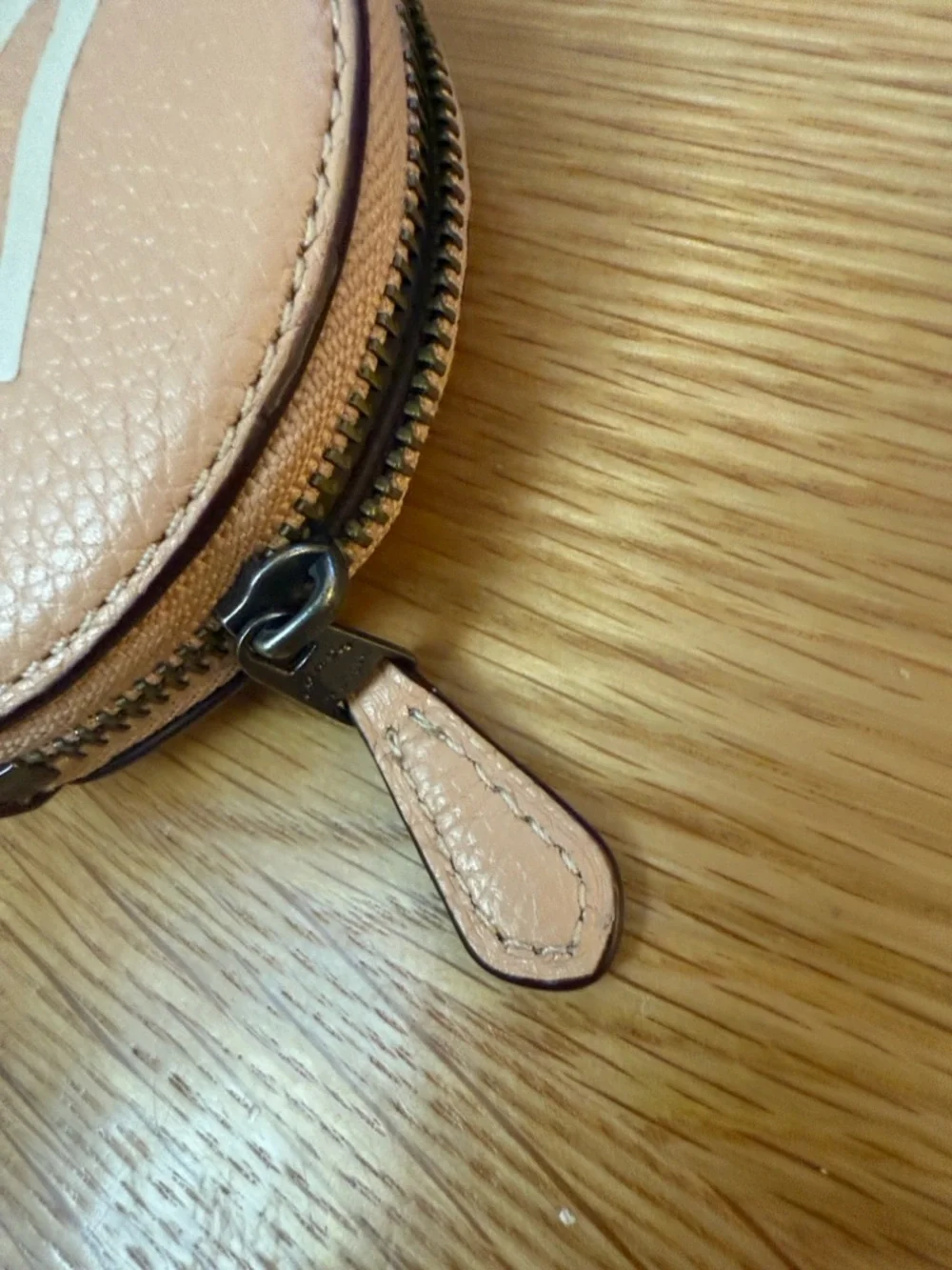 Coach Peach Pebbled Leather Round Coin Case with White Graphic